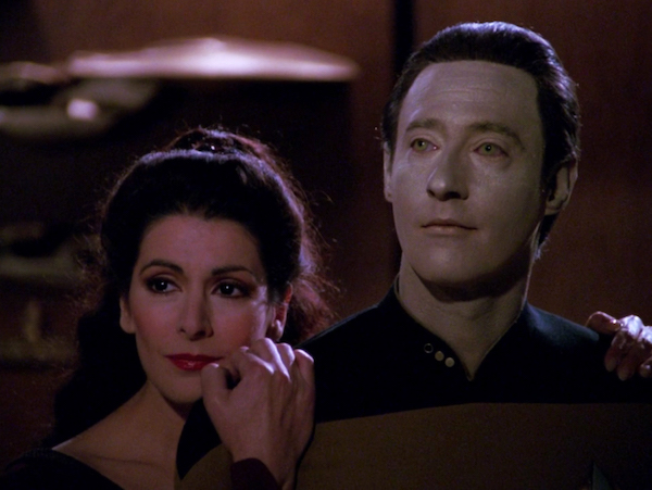 Deanna Troi leaning on Data's shoulder from the Star Trek: The Next Generation episode "Tin Man"
